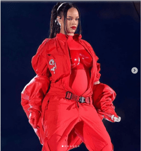 Rihanna wears a tailored Alaia coat for Super Bowl performance, revealing her pregnancy